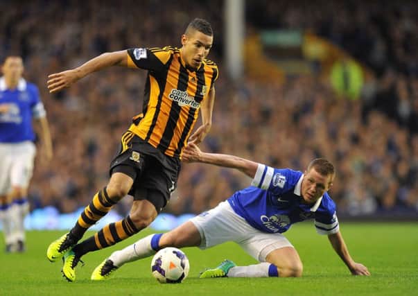 Hull City's Jake Livermore (left) and Everton's James McCarthy