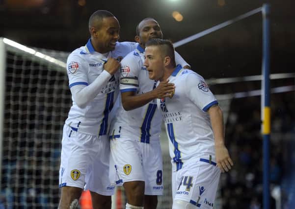 Ross McCormack celebrates his second goal with Dexter Blackstock and Rodolph Austin