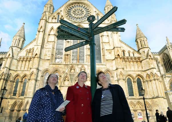 Three Yorkshire Tourist Guides, Jenny Denton,  Louise Keegan and Joy Mitchell-Kardasz outside York Minster.
