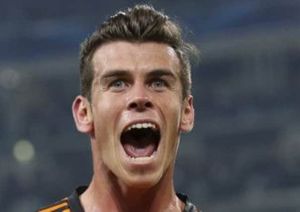 Real's Gareth Bale celebrates after scoring