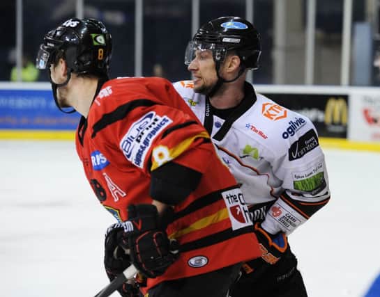 BIG THREAT: Coventry's Ashley Tait, seen above right in action for former club Sheffield Steelers, is one third of a formidable top line for the West Midlands team. Picture: Dean Woolley.