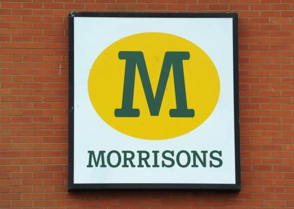 Morrisons  has blamed worsening trade on its weakness in convenience and online retailing as underlying sales slumped by 2.4% in its latest quarter.