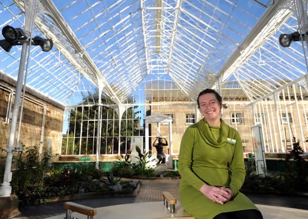 Director Claire Herring inside the restored Victorian conservatory at Wentworth Castle Gardens.