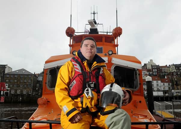 Crewman George Clemintshaw on board the Whitby lifeboat