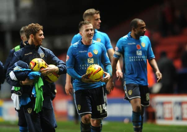 Ross McCormack walks away with the match ball.