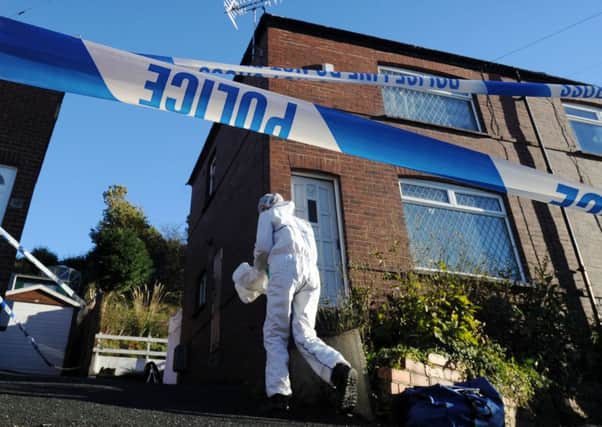 Forensic officers at the House in Wortley, Leeds