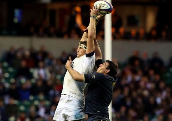 England's Tom Wood wins a lineout against Argentina