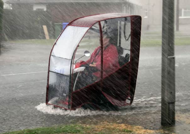 Heavy rain and flash flooding made it hard going for this intrepid traveller in Goole in 2011