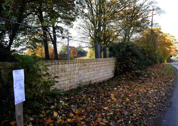 The notice  by the newly built wall blocking the footpath off Wighill Lane in Tadcaster.