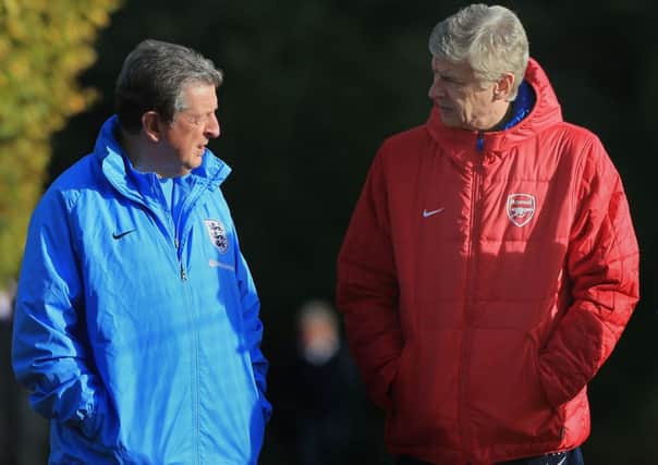 England Manager Roy Hodgson talks with Arsenal Manager Arsene Wenger before the both take their teams training session