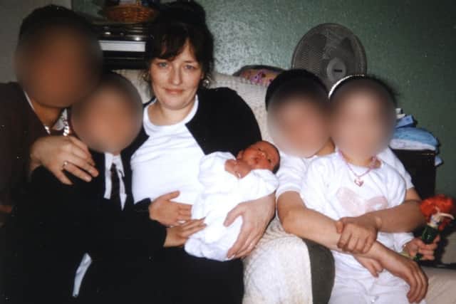 Exclusive family photo of Amanda Hutton with relatives who cannot be identified for legal reasons