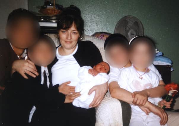 Exclusive family photo of Amanda Hutton with relatives who cannot be identified for legal reasons