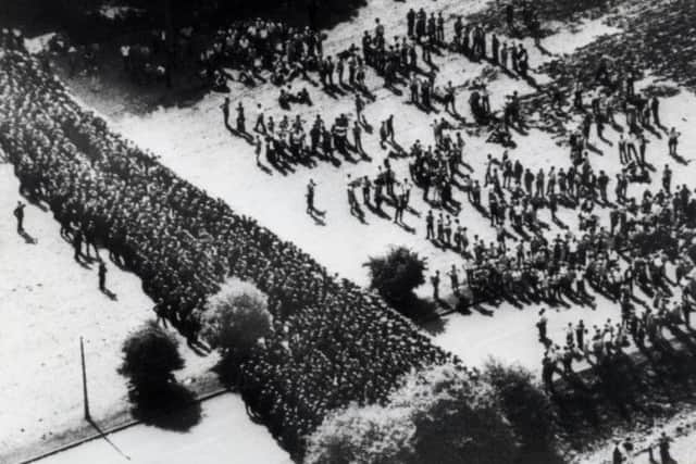 Ranks of police face pickets outside the Orgreave Coking Plant, near Rotherham, in 1984.