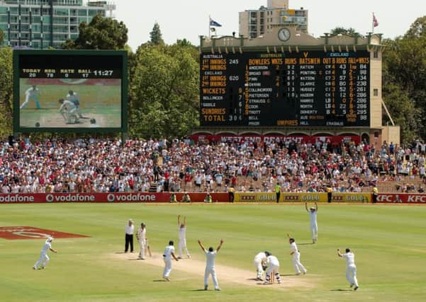 England's Graeme Swann celebrating taking the final wicket of Peter Siddle to win the second Ashes Test at the Adelaide Oval in Adelaide, Australia.