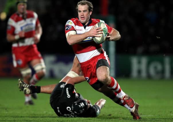 Gloucester's James Simpson-Daniel gets away from Toulouse's Patricio Albecete during the Heineken Cup Pool Six match at Kingsholm. (Pcture: David Davies/PA Wire)