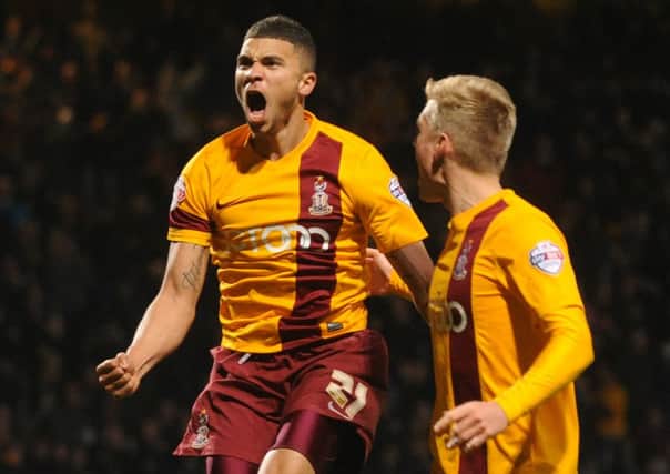 Nahki Wells celebrates City's equaliser from the penalty spot with Alan Connell. (Picture: Bruce Rollinson).