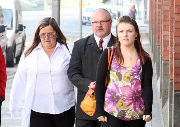 Rosie-Ann Stone (right) with her parents Robert and Angie Stone outside Hull Crown Court.