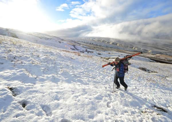 A Skier makes her way up the hill to the Yad Moss Ski slopes near Garrigill, Cumbria