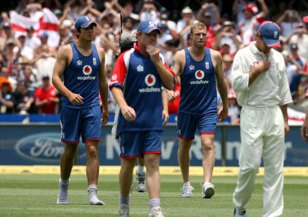 England's (from left to right) Alastair Cook, Ian Bell, Andrew Flintoff and Geraint Jones walk dejected at the end of the first Test match against Australia at the Gabba, Brisbane, Australia in 2006.