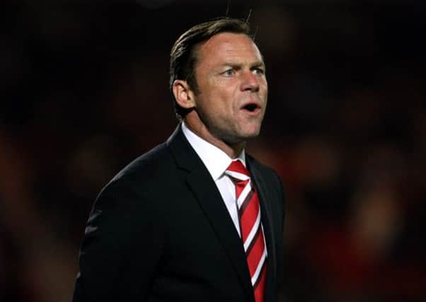Doncaster Rovers manager Paul Dickov looks for two in a row.