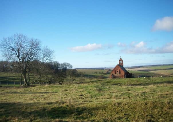 The little church at Cottam medieval village with the development site behind.