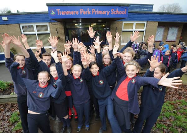 Headteacher Kirsten Finley with pupils at Tranmere Park Primary School, Guiseley