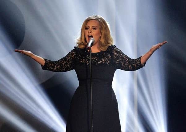 Adele performs during the 2012 Brit awards
