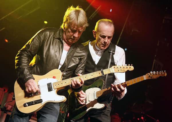 Rick Parfitt and Francis Rossi are still doing their stuff