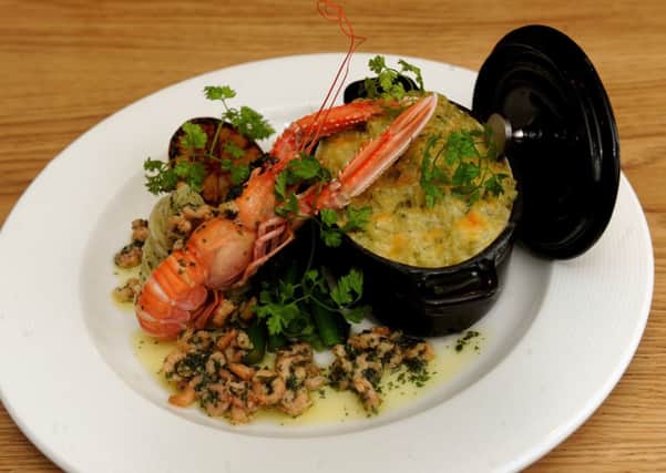 A main course of North Sea fishermans pie  with brown shrimp butter, parsley mash and seasonal greens