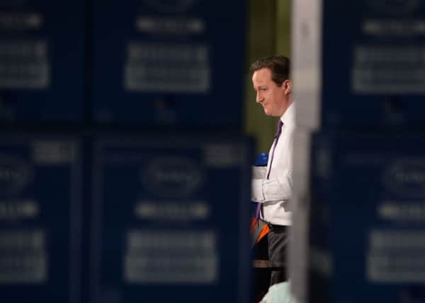 David Cameron on the production line at the Tetley Tea factory in Darlington where he hosted a 'PM Direct' Q&A event.