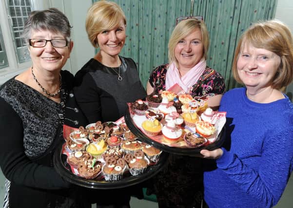 Glenda Eydmann, Rachel Eydmann, Abby Marsh and Lesley Crook with some of their cakes
