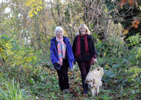 Janice Every with Alison Bates and her guide dog Jack