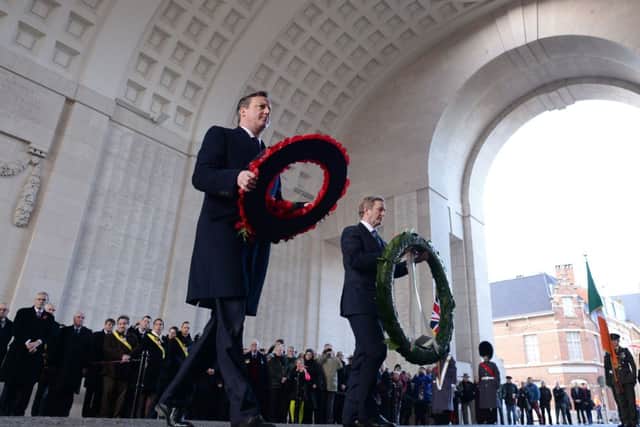 David Cameron and Irish Prime Minister Taoiseach Enda Kenny lay wreathes at the Menin Gate in Ypres, Belgium