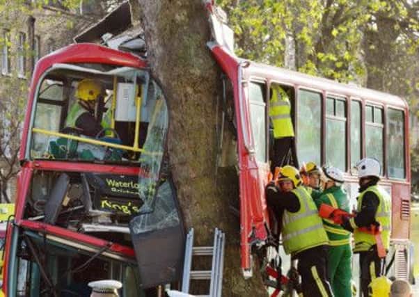 Police, ambulance and fire crews are on the scene of a bus crash in Kennington Road, south London