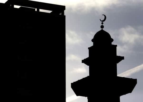 A mosque in Rochdale which stands alongside high rise flats in the town, as a review after nine Asian men were convicted of the systematic grooming and sexual abuse of white girls.