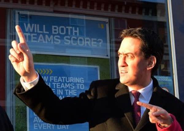 Ed Miliband outside a William Hilll betting shop in north London