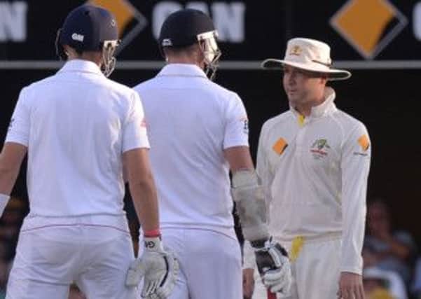 England's James Anderson exchanges words with Australia's Michael Clarke