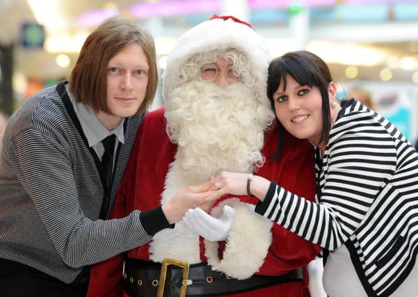 Mark Rolls proposed to his girlfriend Natasha Robinson in Santa Grotto at the White Rose Centre, Leeds.