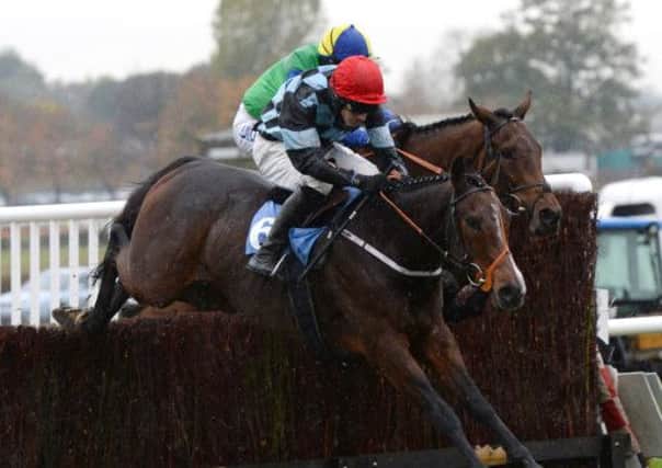 Ultimate ridden by Danny Cook (front) on their way to victory in the bet 365 Handicap Chase at Wetherby Racecourse. Picture: John Giles/PA Wire.