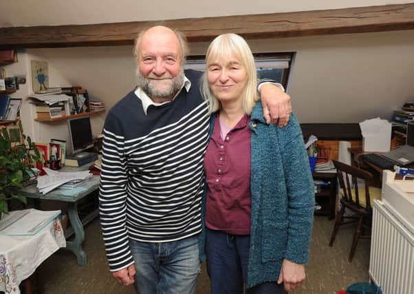 Rony Robinson and Sally Goldsmith in their attic work room at their home in Sheffield.