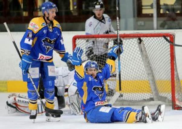 BACK OF THE NET: Hull's Guillaume Doucet celebrates one of his three goals against Nottingham Panthers in the recent 7-5 win over the defending Elite League champions. Picture: Arthur Foster.