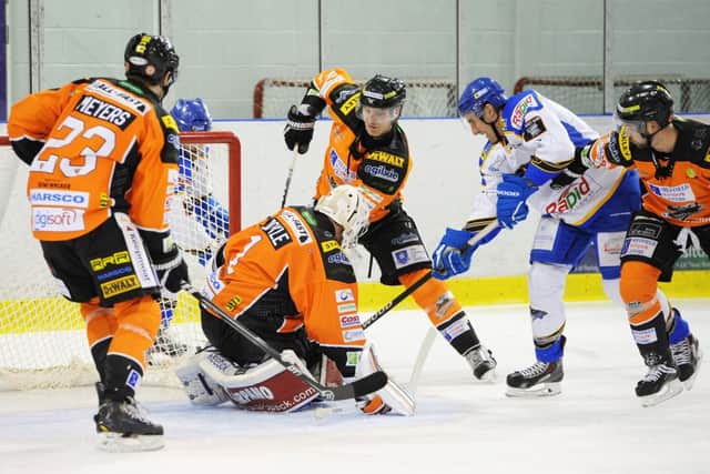 NO WAY THROUGH: Netminder Frank Doyle frustrates a Hull attack at Ice Sheffield. Picture: Dean Woolley.
