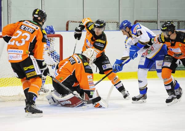 NO WAY THROUGH: Netminder Frank Doyle frustrates a Hull attack at Ice Sheffield. Picture: Dean Woolley.
