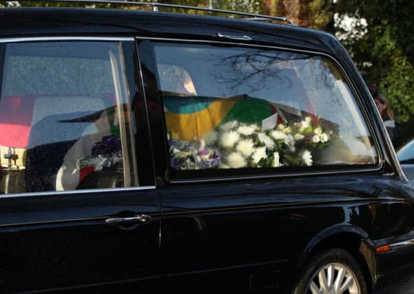 Ronnie Biggs's coffin arrives at Golders Green Crematorium in north London.