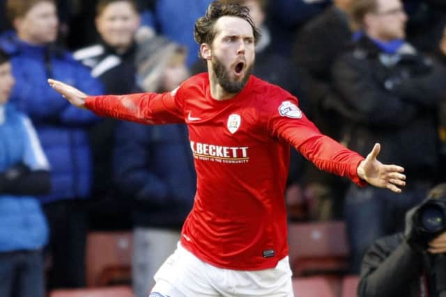 Jim O'Brien celebrates after putting Barnsley ahead