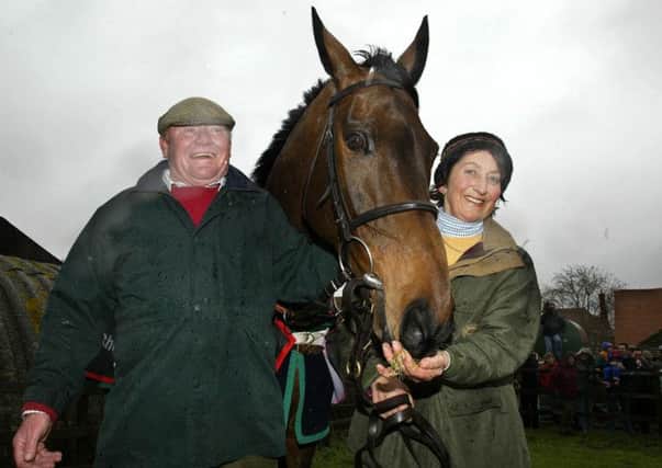 Third time totesport Gold Cup winner, Best Mate, with trainer Henrietta Knight and husband, assistant trainer Terry Biddlecombe. (Picture: Nick Potts/PA Wire).