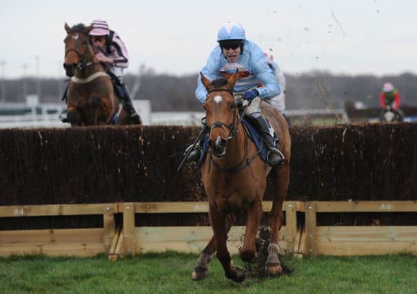 Western Warhorse ridden by Tom Scudamore (right) beats Victor Hewgo ridden by James Reveley