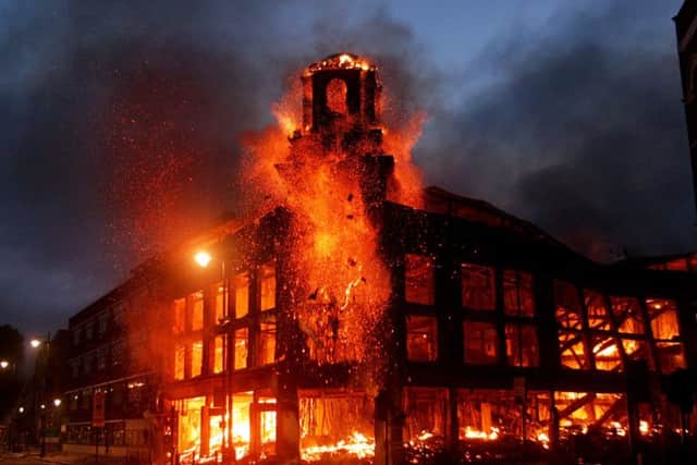 Fire raging through a building in Tottenham, north London, in 2011