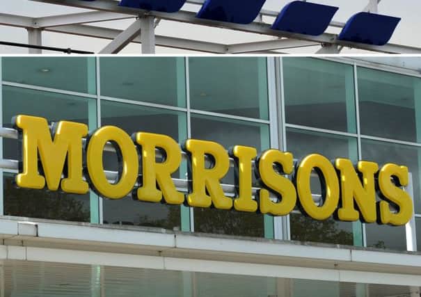Morrisons rerported sharp declines in sales after a "very challenging" Christmas for the supermarket sector.