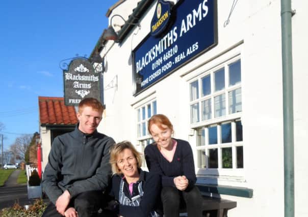 Claire Docwra with Will and Charlotte outside Blacksmiths Arms in Flaxton